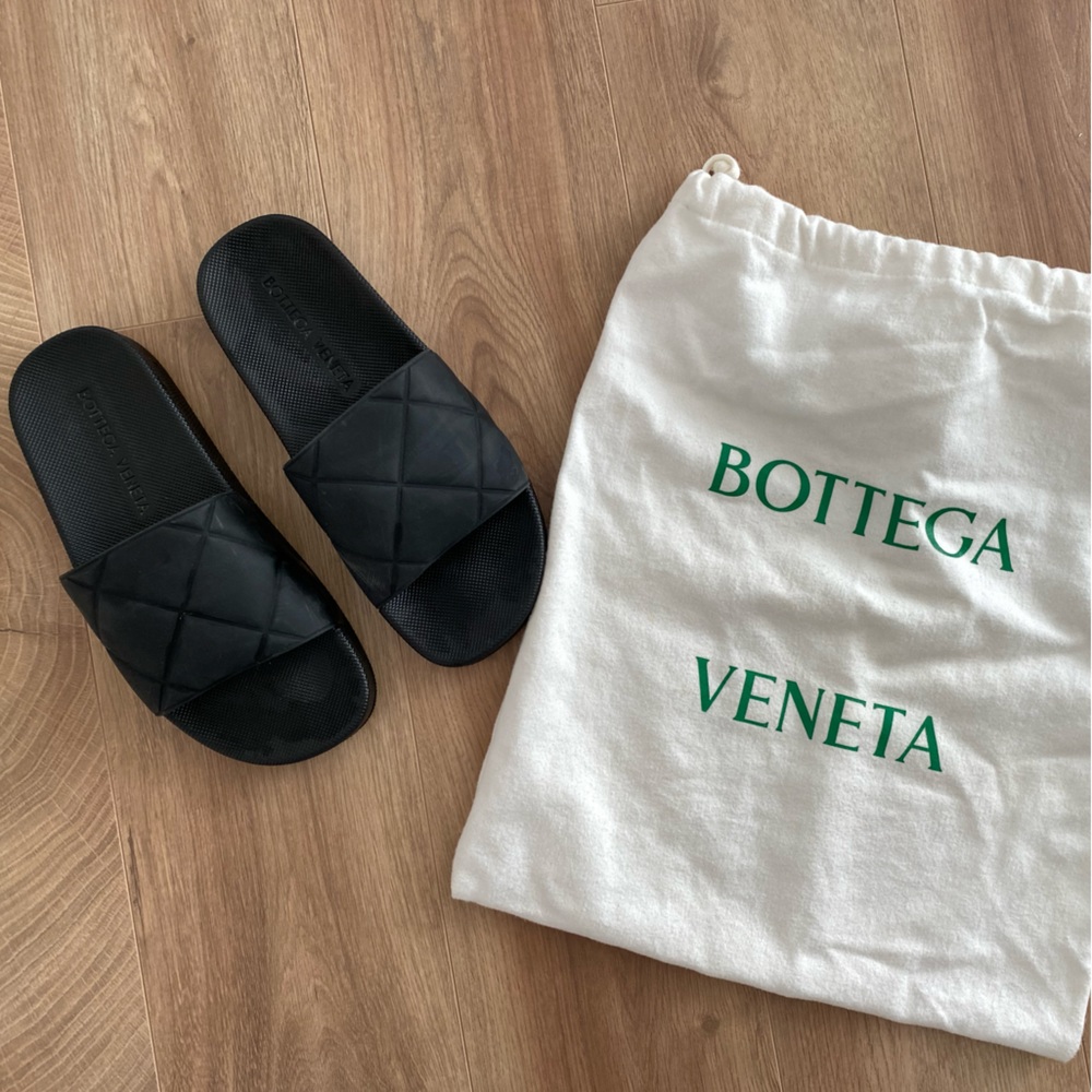 Bottega Veneta black embossed slides
